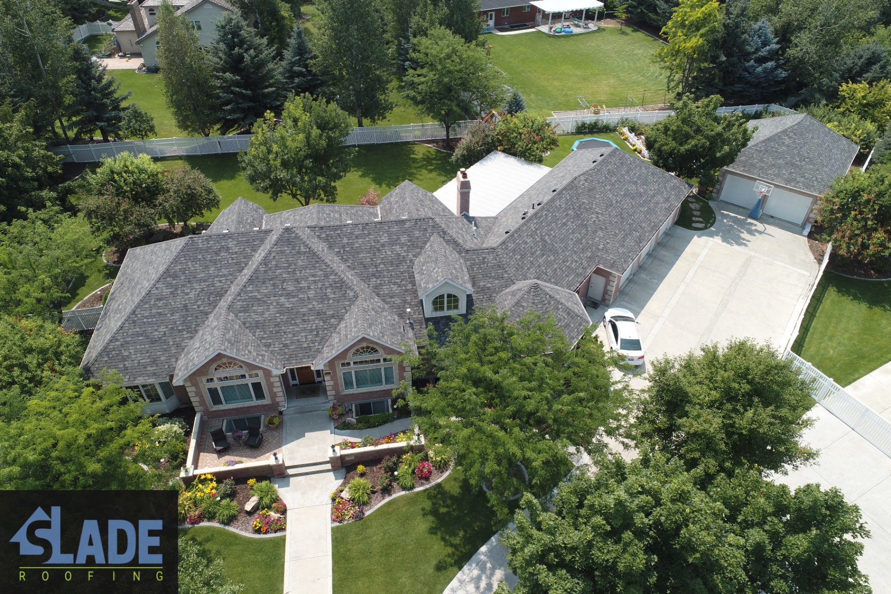 Aerial view of a Slade Roofing shingle roof installation